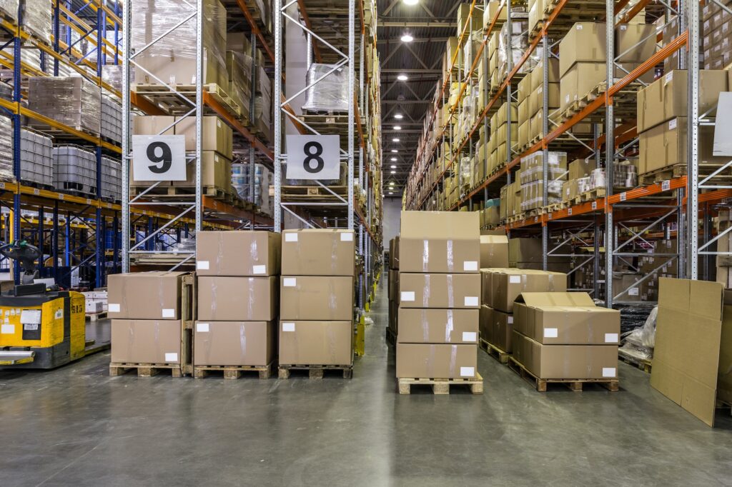 Interior of warehouse with racks full of boxes