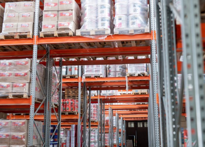 Racks with packed goods in warehouse